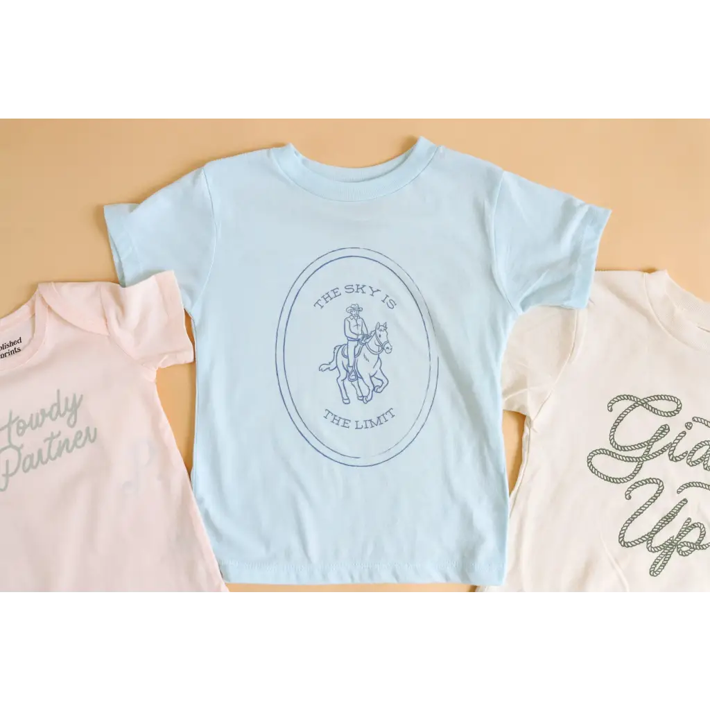 Light blue softest graphic t-shirt featuring a circular Horse and Rider logo design