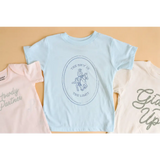 Light blue softest graphic t-shirt featuring a circular Horse and Rider logo design