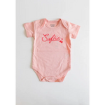 Pink Organic Cotton Softie Baby Onesie featuring cute heart design for stylish infants