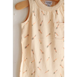 Cream-colored sleeveless dress with tennis print perfect for a super soft pocket playsuit vibe