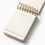 Taking Notes Spiral Notepad with white paper for jotting down ideas