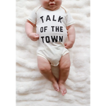 Adorable Talk of the Town newborn baby onesie made from soft organic cotton