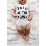 Adorable Talk of the Town newborn baby onesie made from soft organic cotton