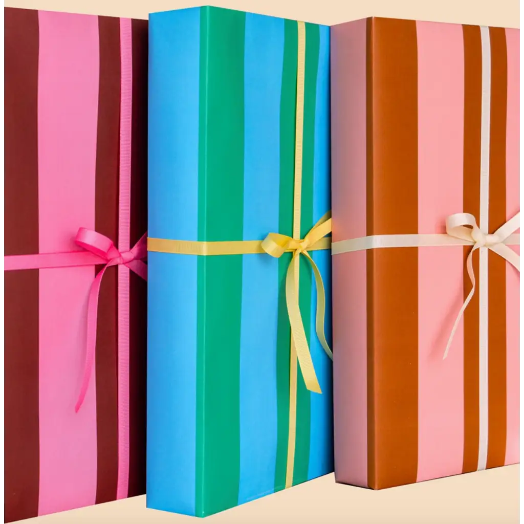 Three colorful wrapped gift boxes on Cute Pink and Brown Modern Wrapping Paper