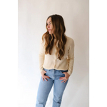 Casual outfit showing the Annie Cardigan Sweater with light-wash jeans and cream colors