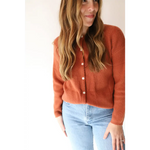 Rust-colored Annie Cardigan Sweater with pearl buttons for effortless style