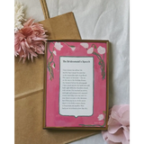 Gold frame wall art print with pink background and floral design, free shipping available