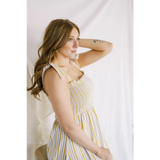 Striped Day Dress with Smocked Bodice, perfect for sunny days and polished prints
