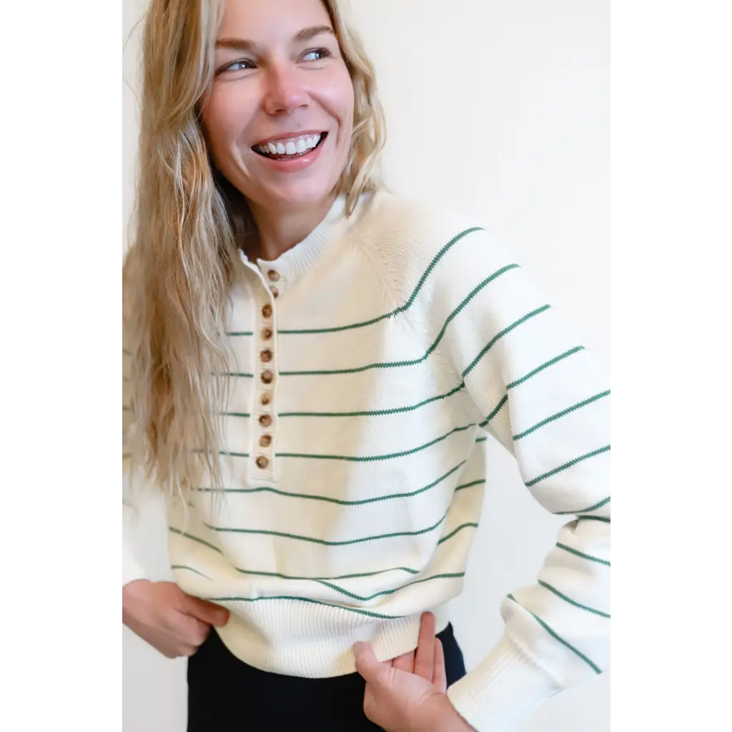 Cream-colored striped Ellen Henley Sweater with buttons and balloon sleeves for classic style