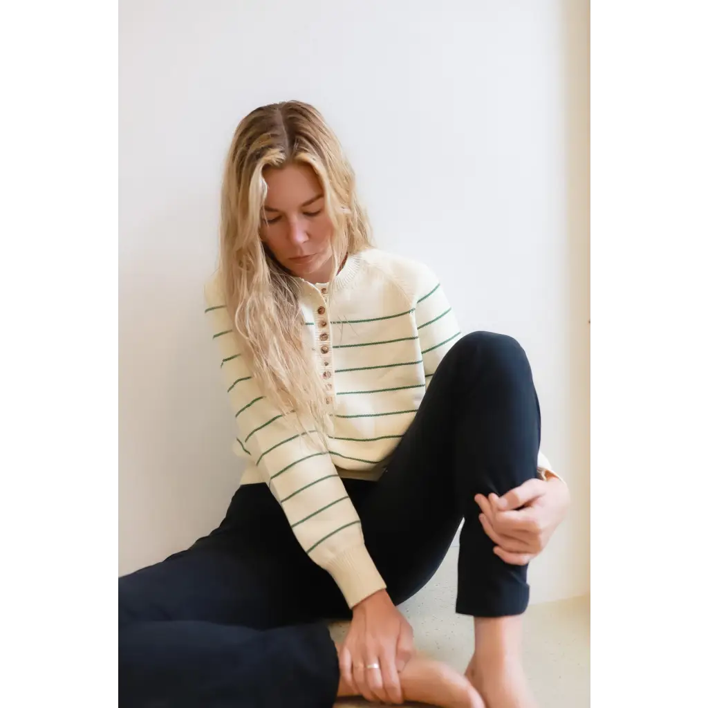 Ellen Henley Sweater with decorative buttons, perfect for classic style and chic looks
