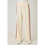 Cream tracksuit pants with red side stripes and elastic waistband for a casual look