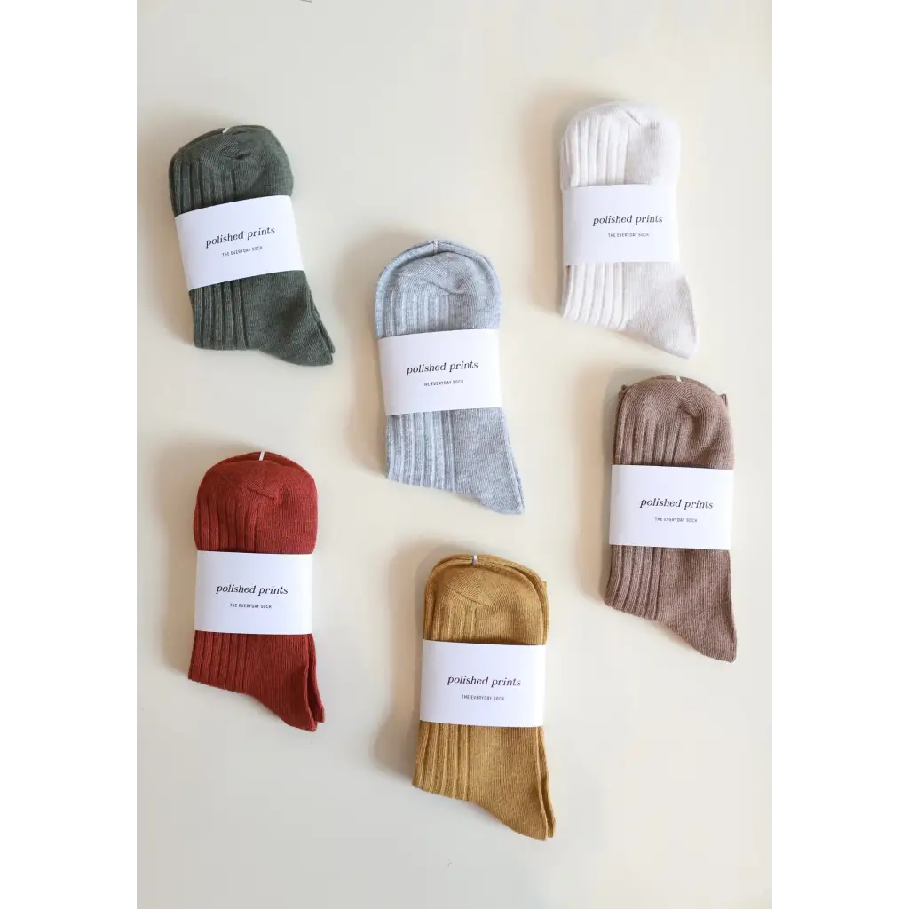 Soft and flexible everyday sock collection in muted earth tones and olive green ribbed design