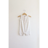 White floral sleeveless Henley romper hanging for Babies in super soft organic cotton