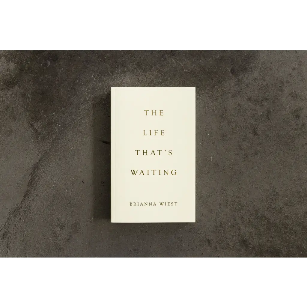 Cream-colored book titled The Life That’s Waiting by Brianna Wiest with minimalist design