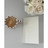 White ceramic mug with coffee bean design and latte from The Life Thats Waiting