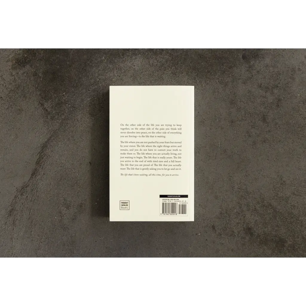 White book with barcode and logo from The Life That’s Waiting, perfect for polished prints