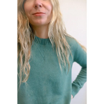 Teal Margo Crew Neck Sweater perfect for cozying up in style
