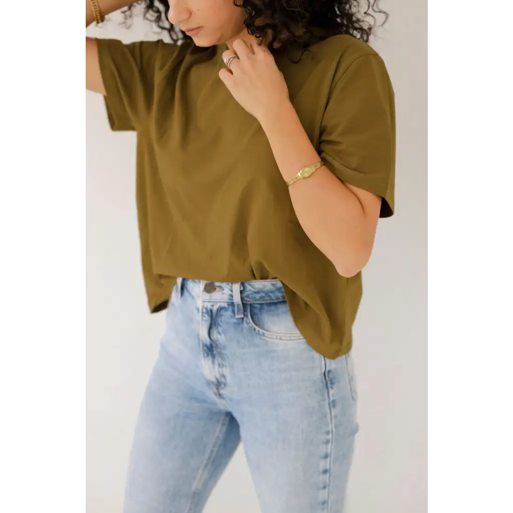 Olive green mom crop boxy tee with light wash jeans for a stylish casual look