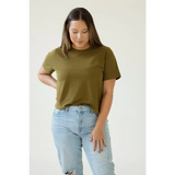Olive green boxy tee designed for moms styled with light wash distressed jeans