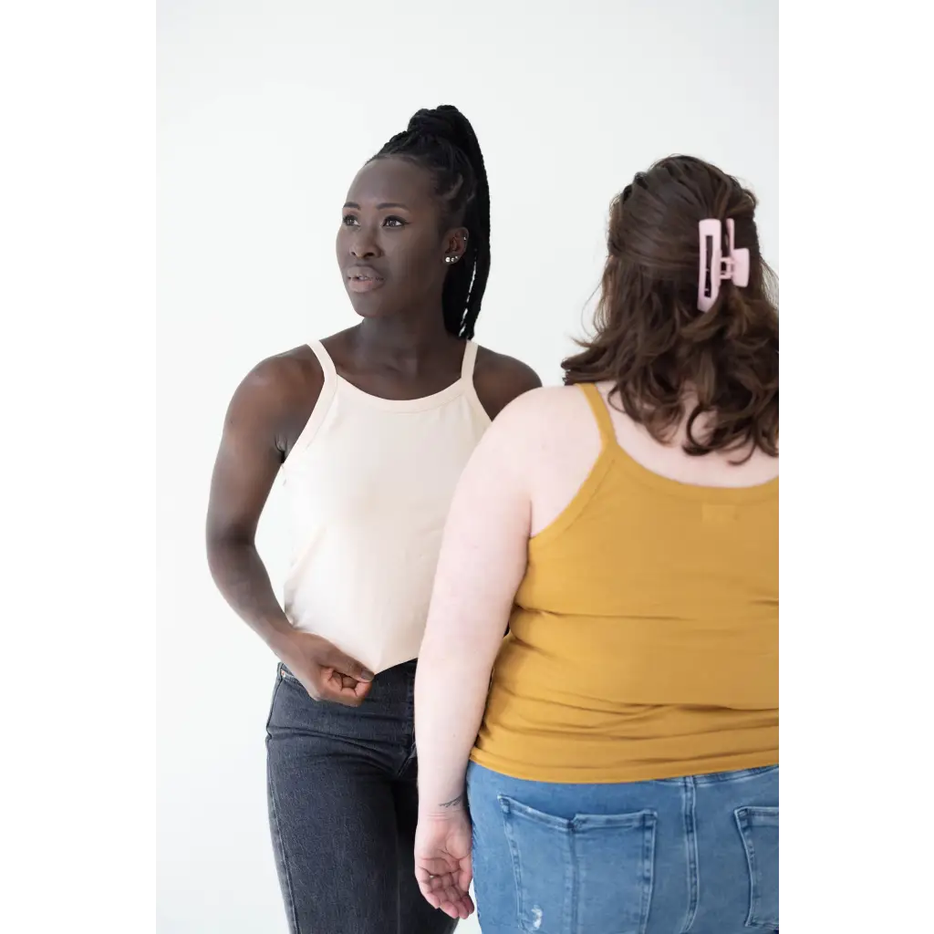 Two people in casual tank tops showcasing the Mustard Yellow Mom Tank for stylish womens clothes