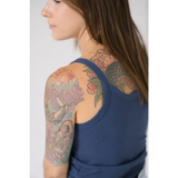 Colorful floral sleeve tattoo with Navy Transitional Mom Tank Top showcasing recommended sizing
