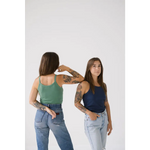 Two tattooed friends rock Navy Transitional Mom Tank Tops with recommend sizing style