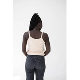 Back view of person in Shifting Sand Mom Tank with Polished Prints and dark jeans