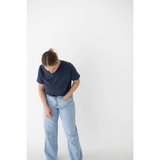 Light blue wide-leg jeans with a navy mom tee in comfy spandex blend