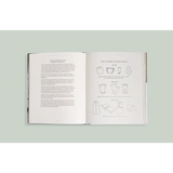 Open book with text and line drawings, perfect for expecting parents organizing their home