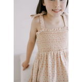 Floral smock dress in beige with tie straps, perfect mini play dress for kids