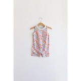 Floral sleeveless romper on wooden hanger, perfect super soft organic cotton pocket playsuit