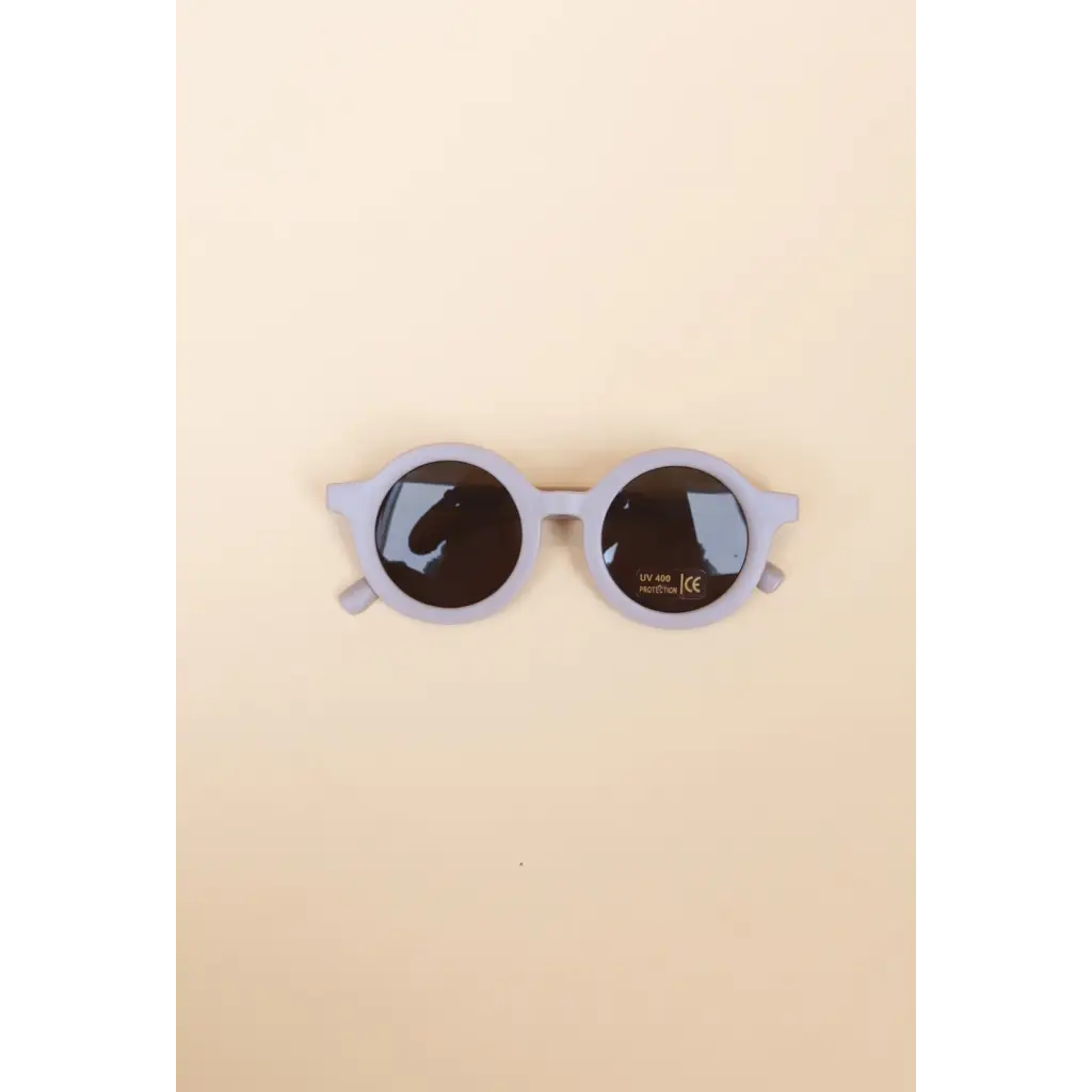 Round lilac sunglasses with dark lenses for stylish baby and toddler round retro look