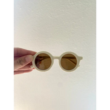 Cream-colored round retro sunglasses for baby and toddler style with brown lenses