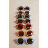Pastel Round Retro Sunglasses for Baby and Toddler Style in a chic vertical display