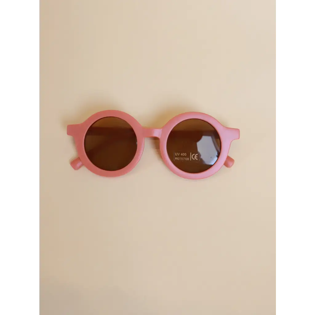 Round pink sunglasses with brown lenses perfect for toddler baby round retro style