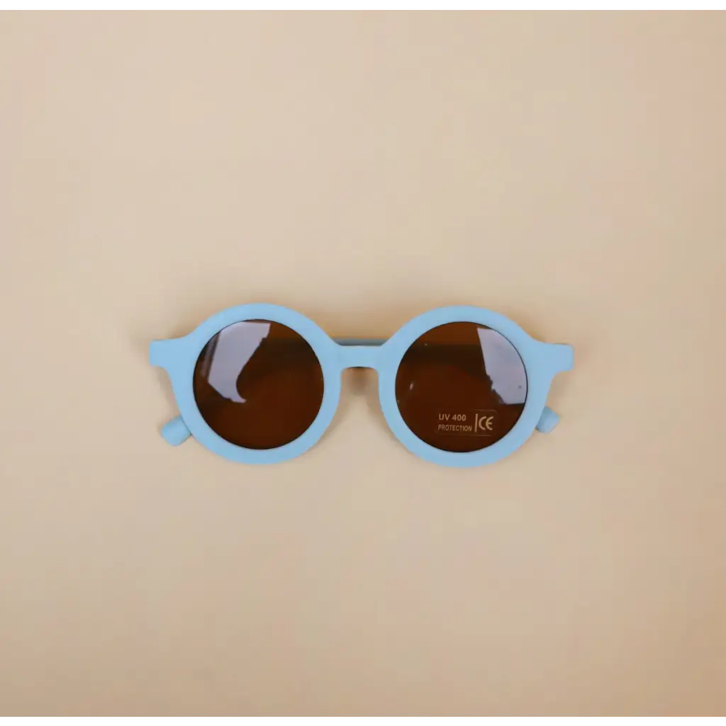 Light blue round retro sunglasses with brown lenses for baby and toddler style