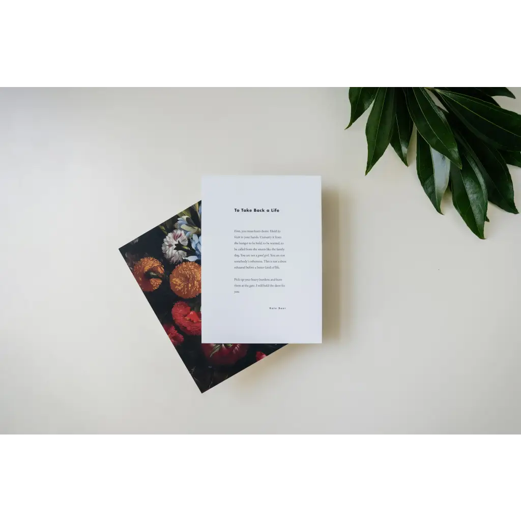 Two overlapping books with one open, perfect for Floral Art Print with free shipping