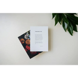 Two overlapping books with one open, perfect for Floral Art Print with free shipping