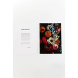 Book page with text and colorful floral art print, with free shipping featuring excerpts