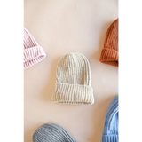 Cream-colored ribbed knit beanie from our Small Collection, super soft and stylish