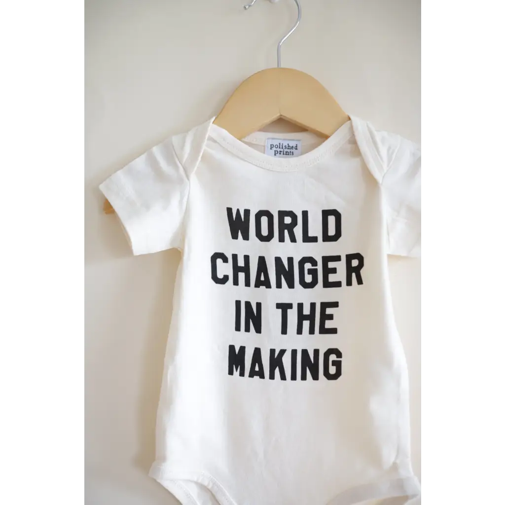 Adorable World Changer Baby Onesie in organic cotton, perfect for little ones ready to inspire