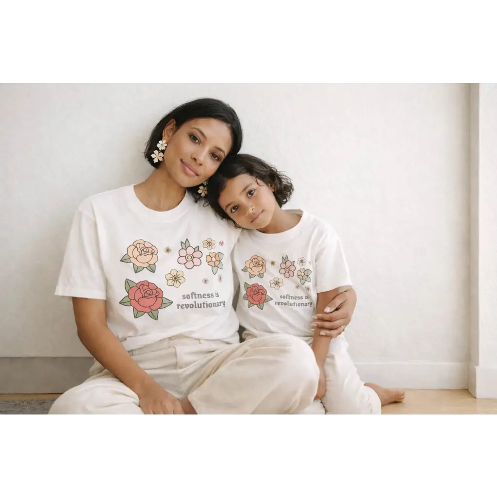 Oversized unisex tee with cotton comfort floral roses and softness is revolutionary text