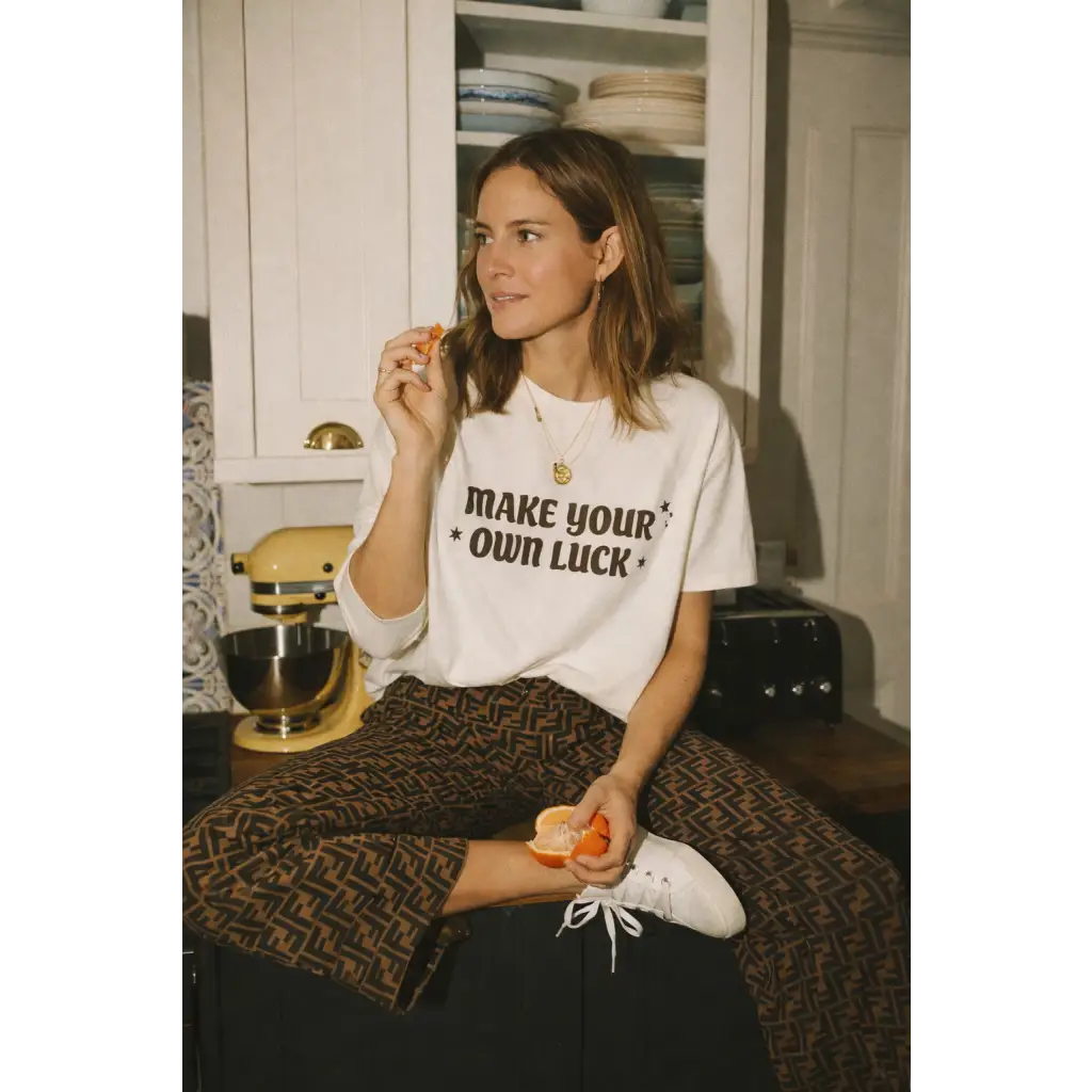 White oversized unisex tee with Make Your Own Luck graphic in cotton comfort