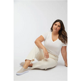 Relaxed high rise white linen pants with elastic waist in ecru