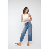 White sleeveless tank with high neckline and cropped hem over Aberdeen high rise vintage worn jeans