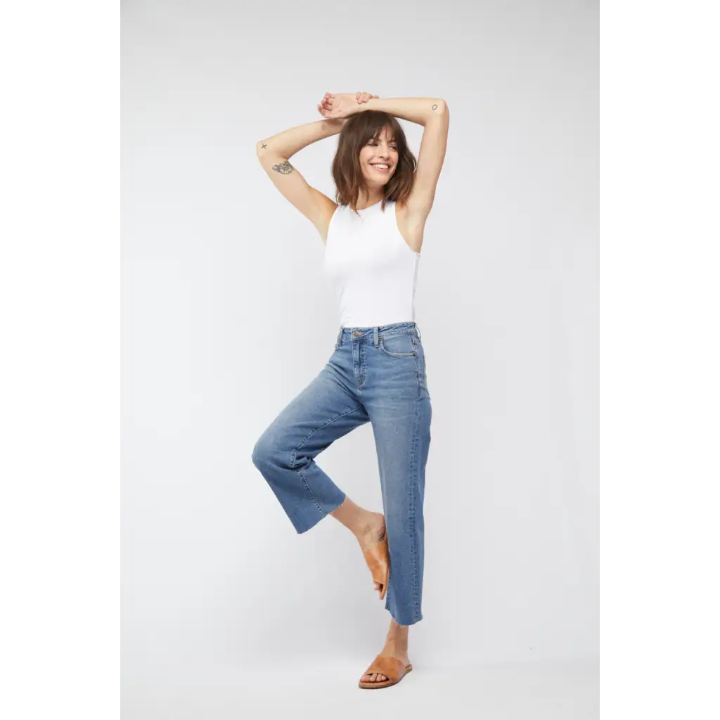 White sleeveless tank top in high rise vintage worn style