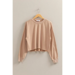 Beige cropped sweatshirt on a hanger, perfect for stylish womens clothes and polished prints