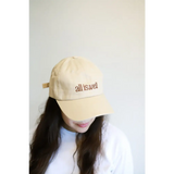 Beige embroidered baseball hat with all is well text perfect for casual vibes