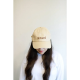 Beige embroidered baseball hat featuring All is Well message for a trendy look