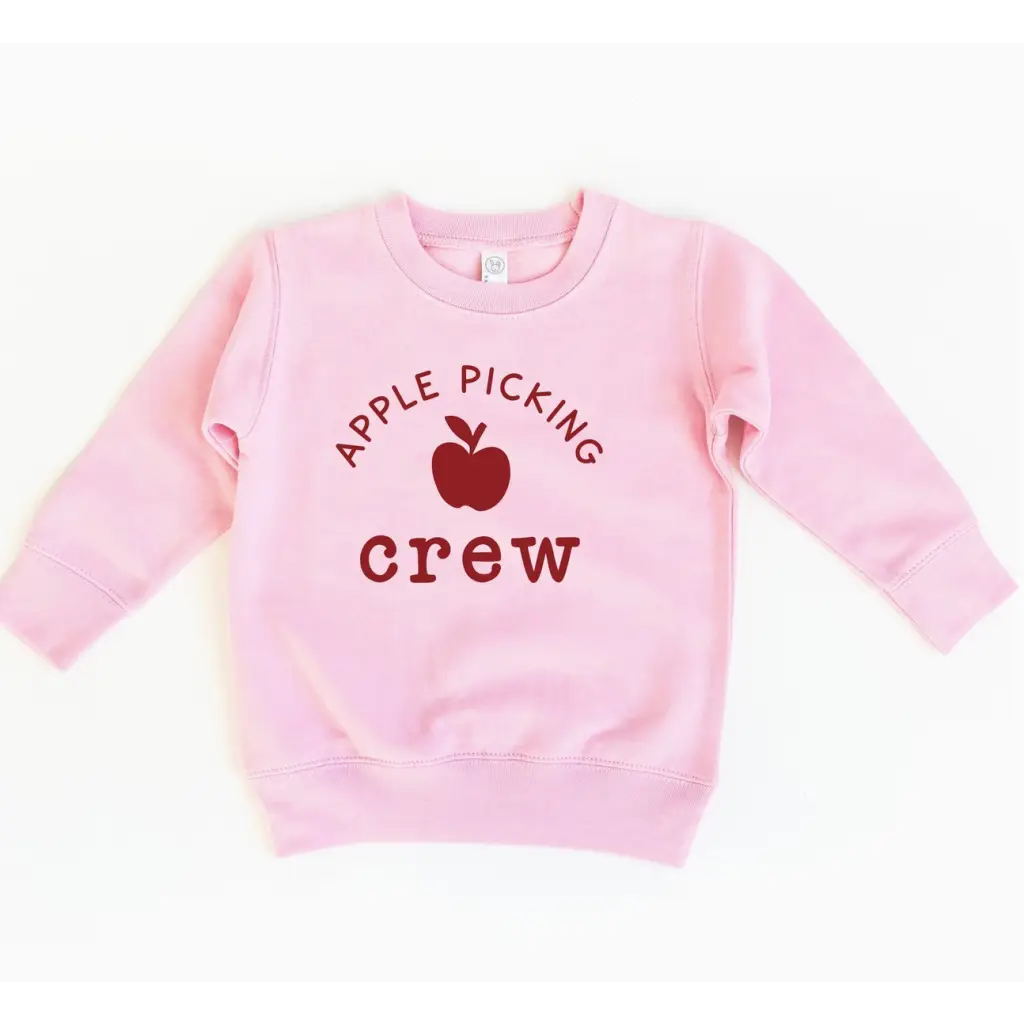 Pink crewneck sweatshirt with apple picking design, perfect for stylish moms and kids